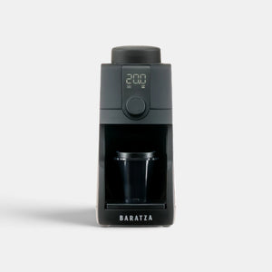 Bootlegger Coffee Baratza Encore ESP Pro espresso grinder in matte black with a digital display and dosing cup