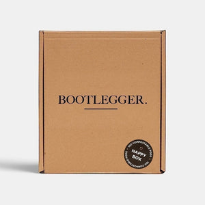 Bootlegger Coffee bulk box containing 100 compostable coffee capsules in a brown cardboard package.