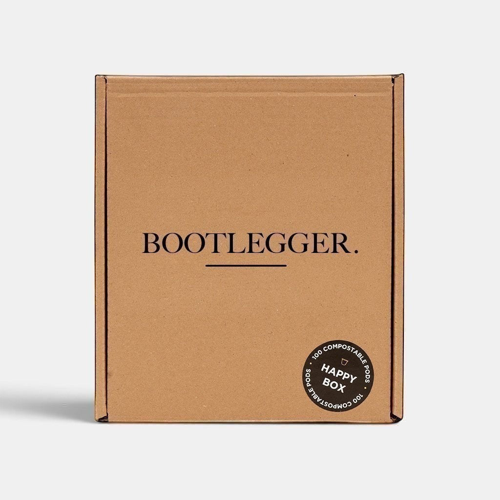 Bootlegger Coffee bulk box containing 100 compostable coffee capsules in a brown cardboard package.