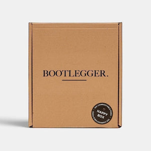 Bootlegger Coffee bulk box containing 100 compostable coffee capsules in a brown cardboard package.