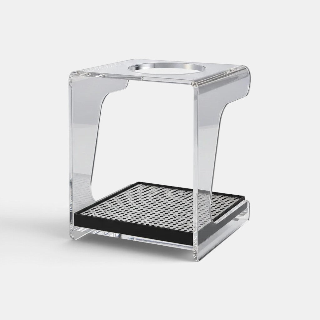 Bootlegger Coffee Hario V60 acrylic pour-over drip station with a black perforated base on a white background.