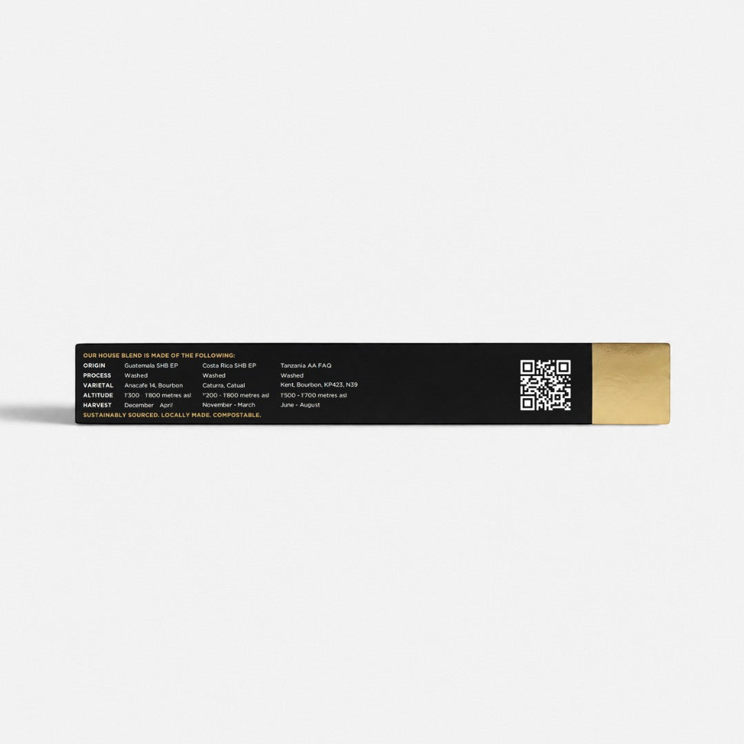 Bootlegger Coffee House Blend capsule box side view showing origin, process, and harvest details with a QR code