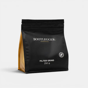 Bootlegger Coffee House Blend 250g filter grind coffee in a black and gold stand-up pouch